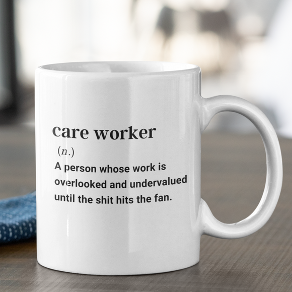 Fun definition of a care worker gift mug, printed with care worker (n.) A person whose work is overlooked and undervalued until the shit hits the fan